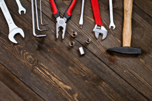 tools on a wooden background